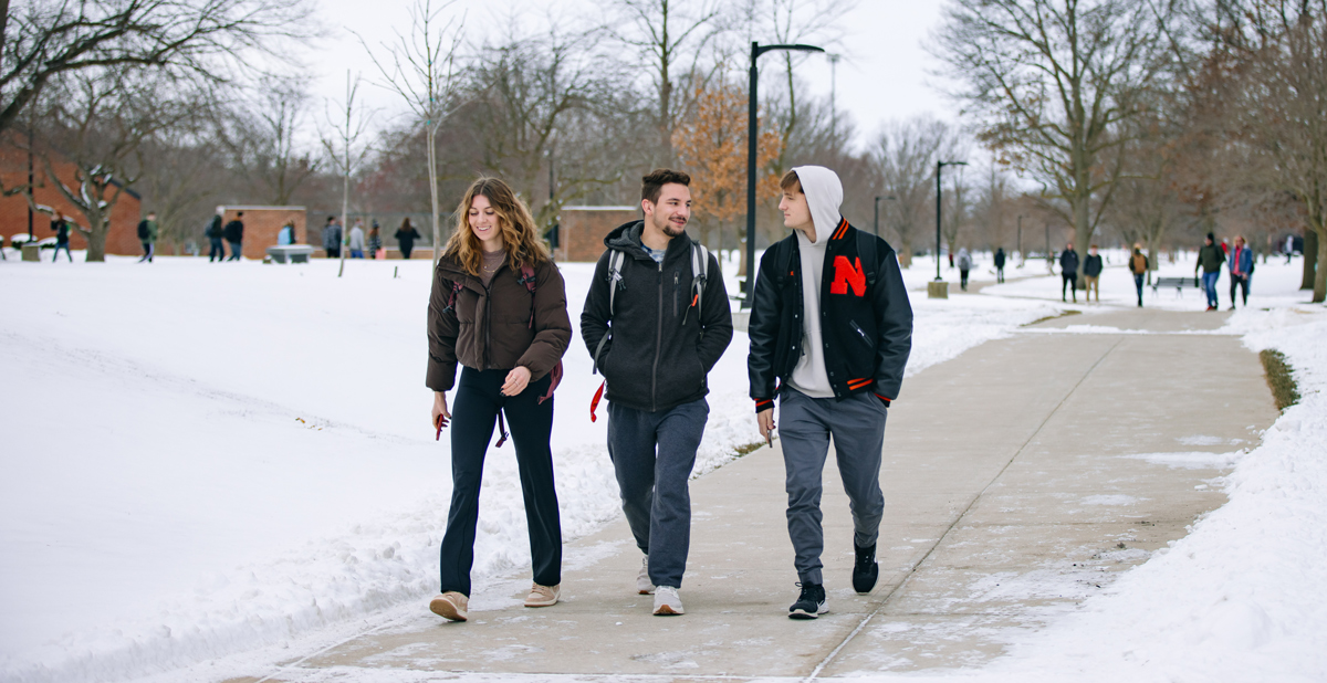 students walking to class in the snow