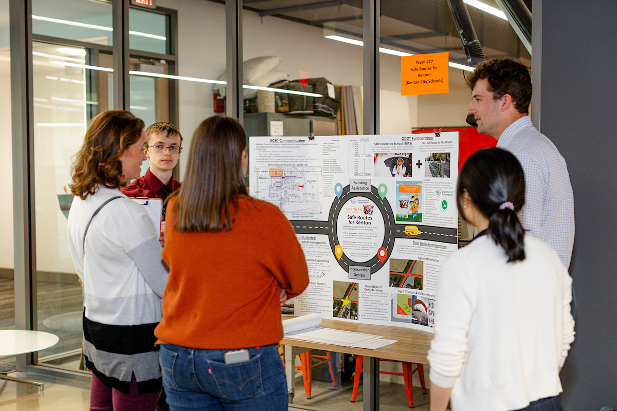 students presenting research