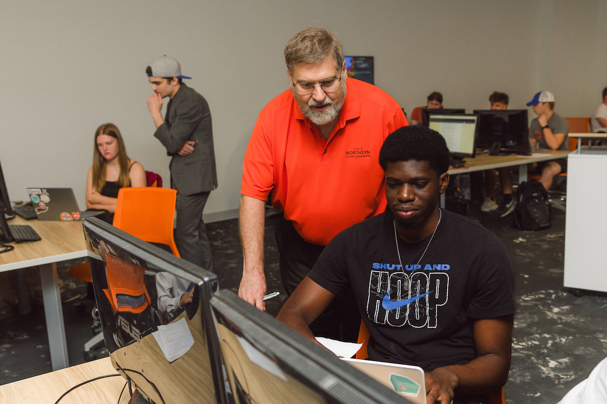 professor teaching computer engineering