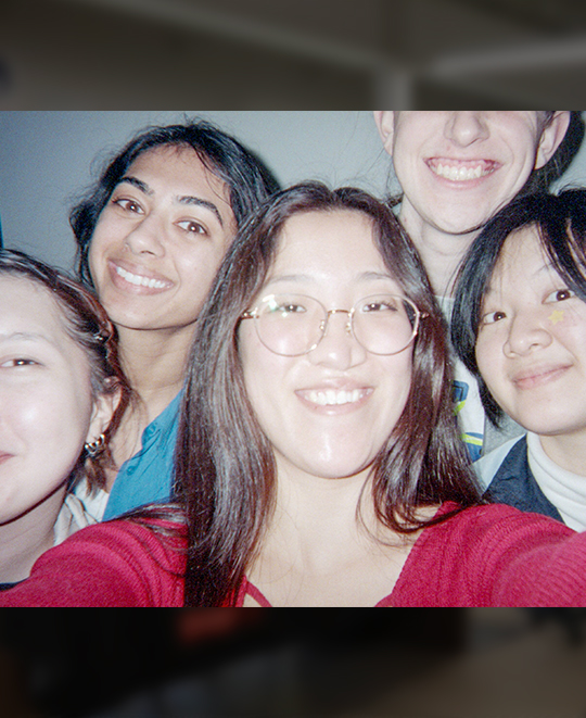 polaroid selfie with group of 5 people