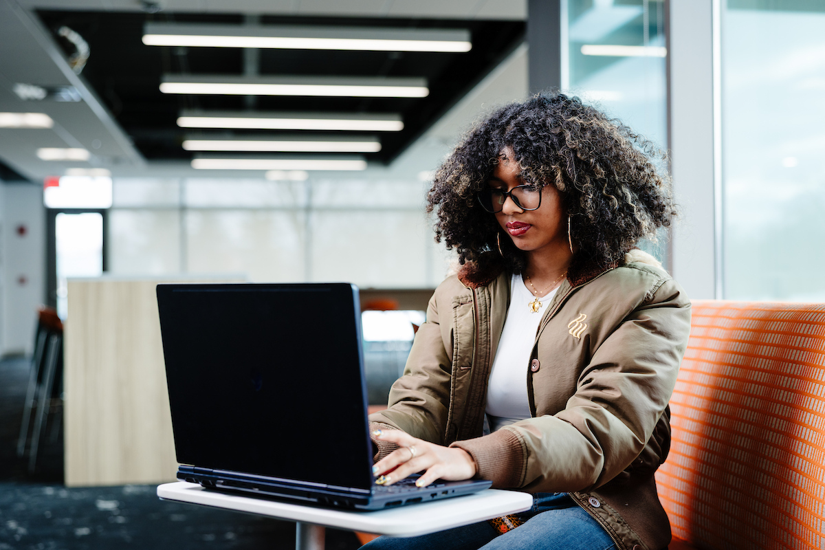 student studying in lounge area