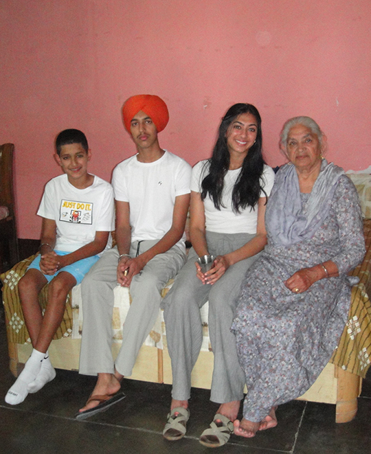 Group of 4 family like photo all seated together