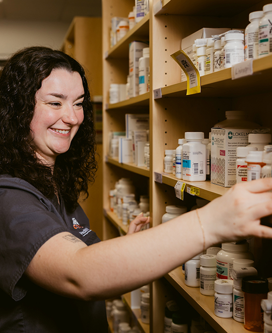 Hailey in the pharmacy backroom getting medicine