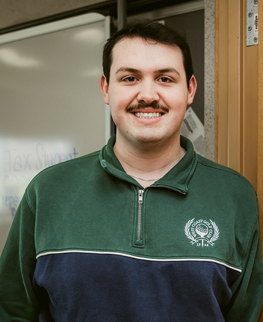 Justin posing for a photo