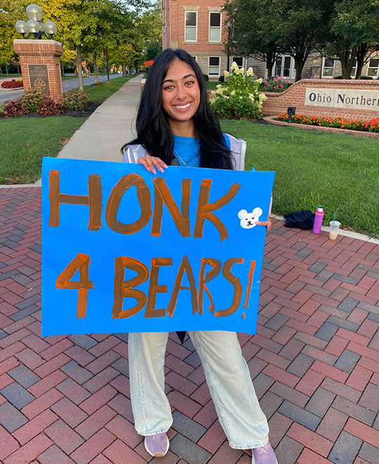ONU student holding blue sign that says Hong 4 bears