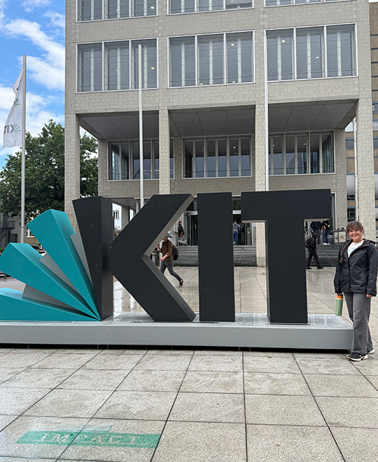 Exterior of a building on the Karlsruhe Institute of Technology (KIT) campus featuring large "KIT" signage.