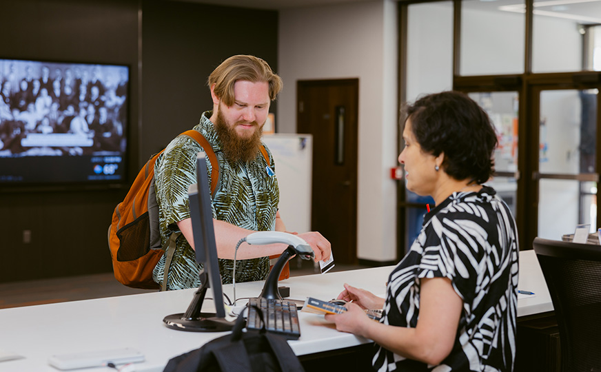 ONU staff helping students 