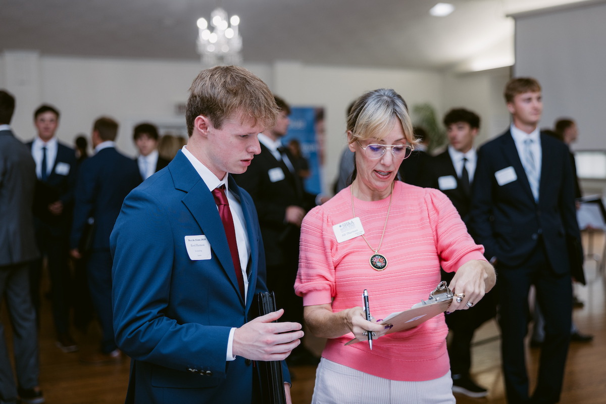 student getting assistance for a job