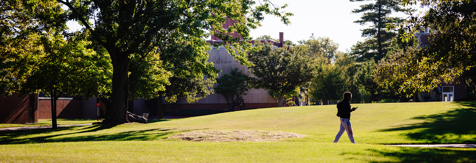 ONU student walking on the grass