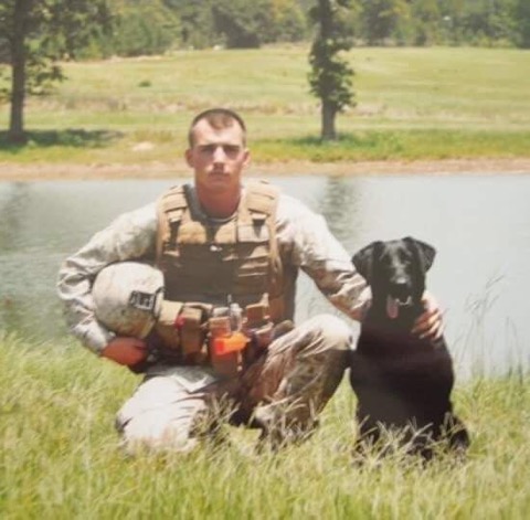 Photo of Jake and his dog