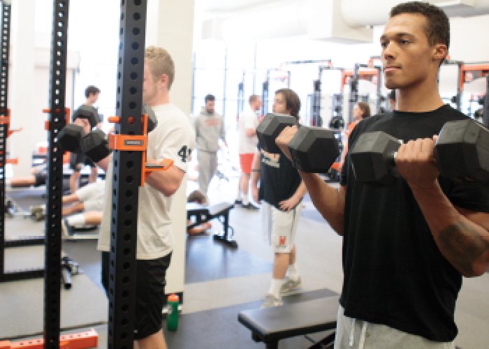 Students lifting weights