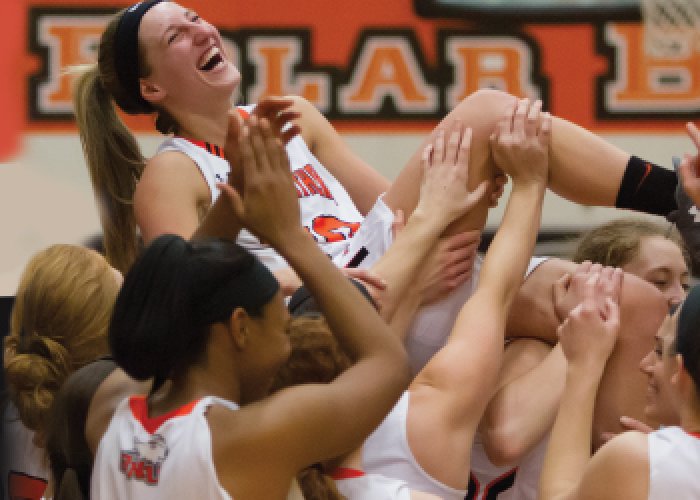 Basketball team celebrating