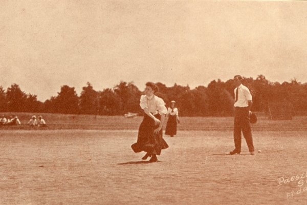Historical photo of Elizabeth throwing out a pitch