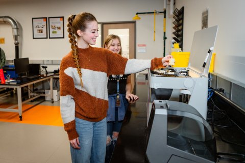Photo of ONU students working with lab equiptment