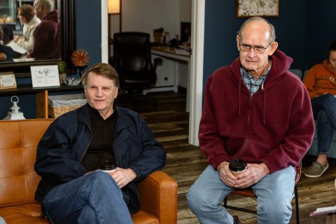 Photo of 2 members of the group