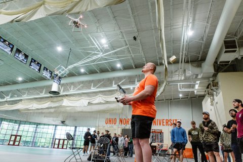 Photo of ONU student flying a drone