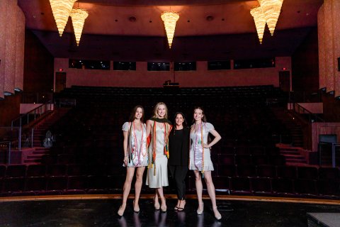 Photo of all 3 sisters with their mentor