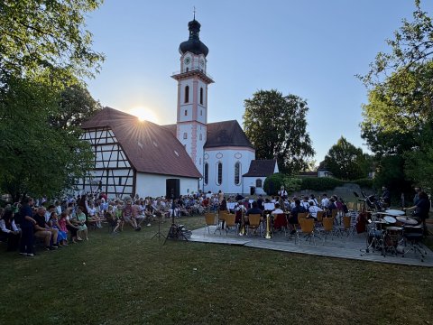 Ohio Northern University and German music program participants performing together outdoors.