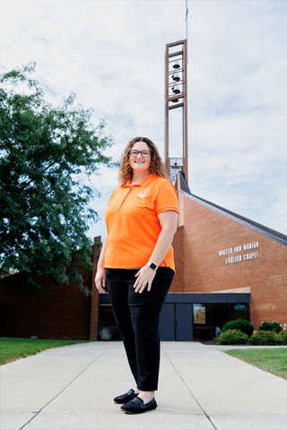 Portrait of Reverend Brandi Grant-Rigsby, Director of Religious and Spiritual Life and University Chaplain at Ohio Northern University, standing outdoors on campus.