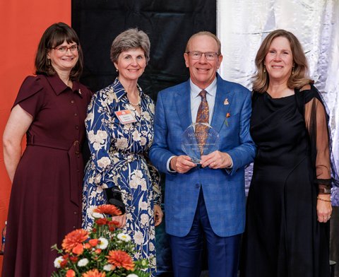 Hanley Wheeler being presented with his Distinguished Alumni Award