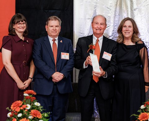 Judge Zimmerman being presented with his Distinguished Alumni Award