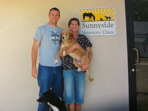 J.J. Coate-Walters and her husband at their veterinary practice