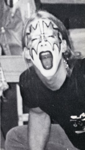 Historical photo of student with face painted