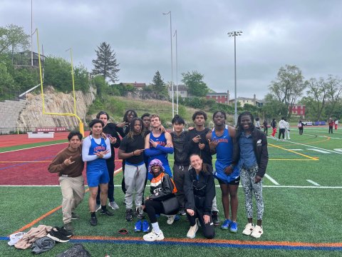 Group photo of Emily with Bonus Coaching team