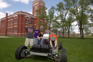 Students with the lunar rover vehicle