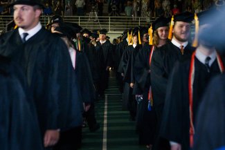 Photo of graduates in thier caps and gowns