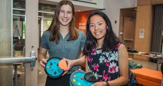 Photo of ONU students with their hand therapy device