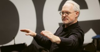 Photo of Dave conducting