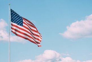 American Flag by Aaron Burden via Unsplash.