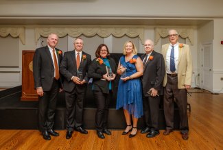 Six Ohio Northern University alumni pose for photo an the 2022 Distinguished Alumni Awards banquet.