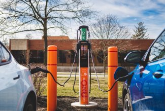 Two cars charging at an EV charging station at Ohio Northern University.