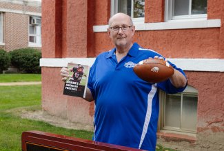 Photo of Russ Crawford, published author of a book about women who play tackle football