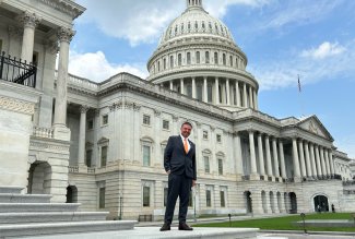 ONU HealthWise Pharmacy director Michael Rush, PharmD, in front of the U.S. Capitol.