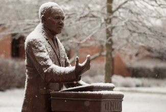 Ohio Northern University's Martin Luther King, Jr. statue with a dusting of snow.