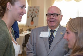 Photo of Ron Woofter with 2 students