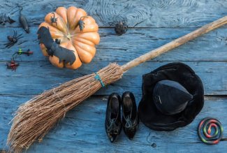 witch broom, hat, shoes, pumpkin and fake bats.