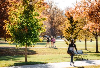 Students walking on Ohio Northern University's campus in fall '22.