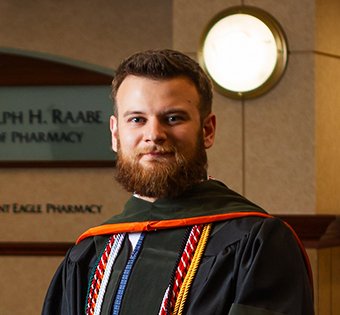 Photo of Reese in his graduation gown