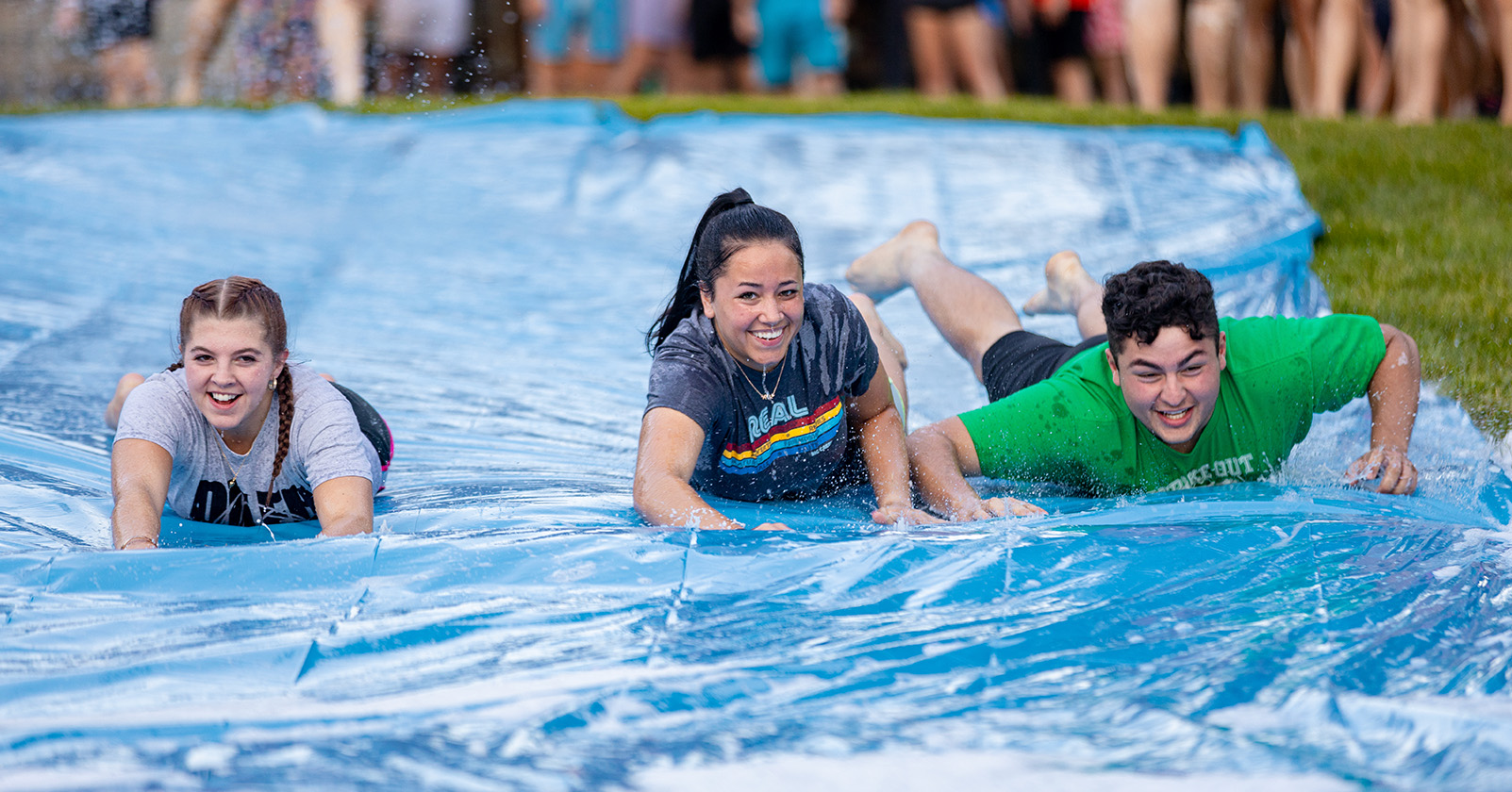 Students enjoy welcome weekend slip-and-slide